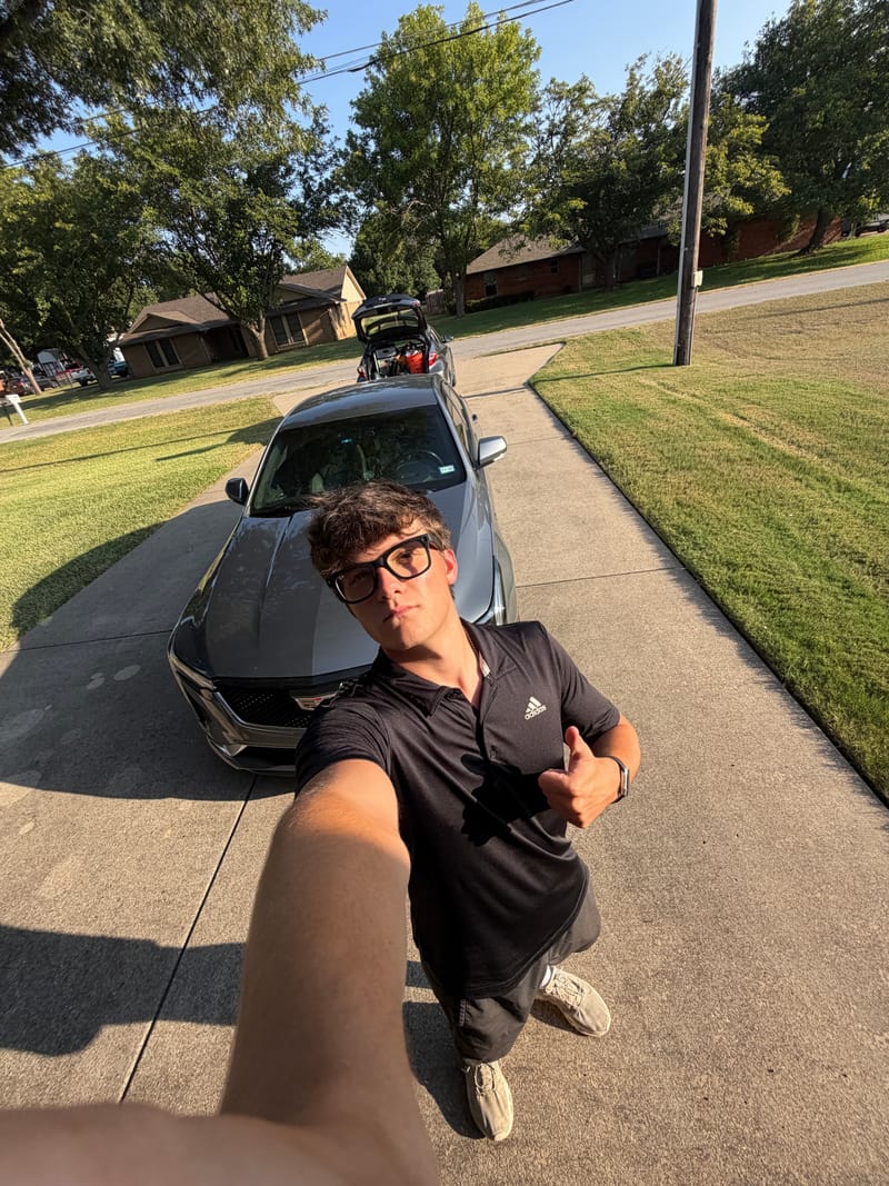Josh with a freshly detailed car